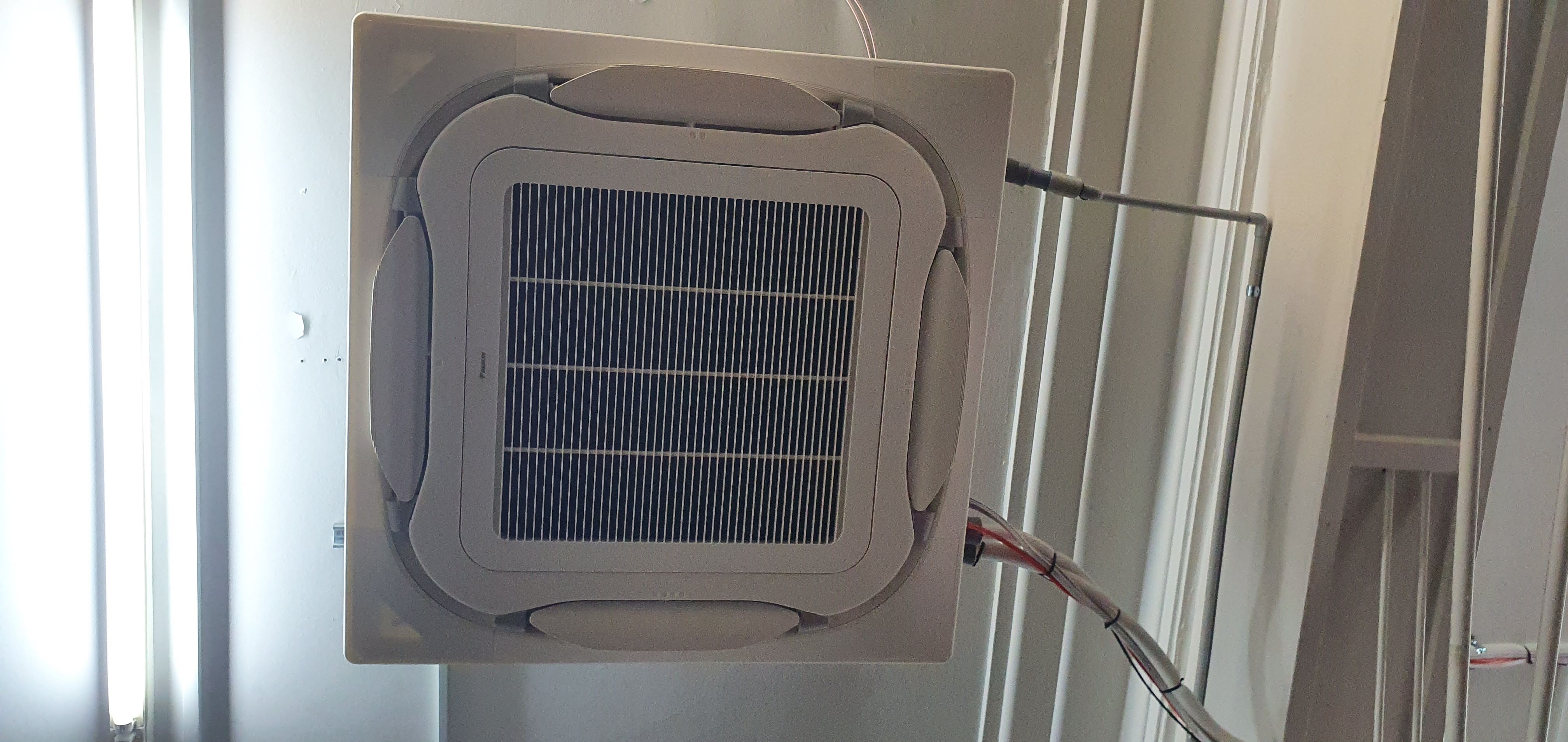 Daikin cassette air conditioning installed in a light commercial space