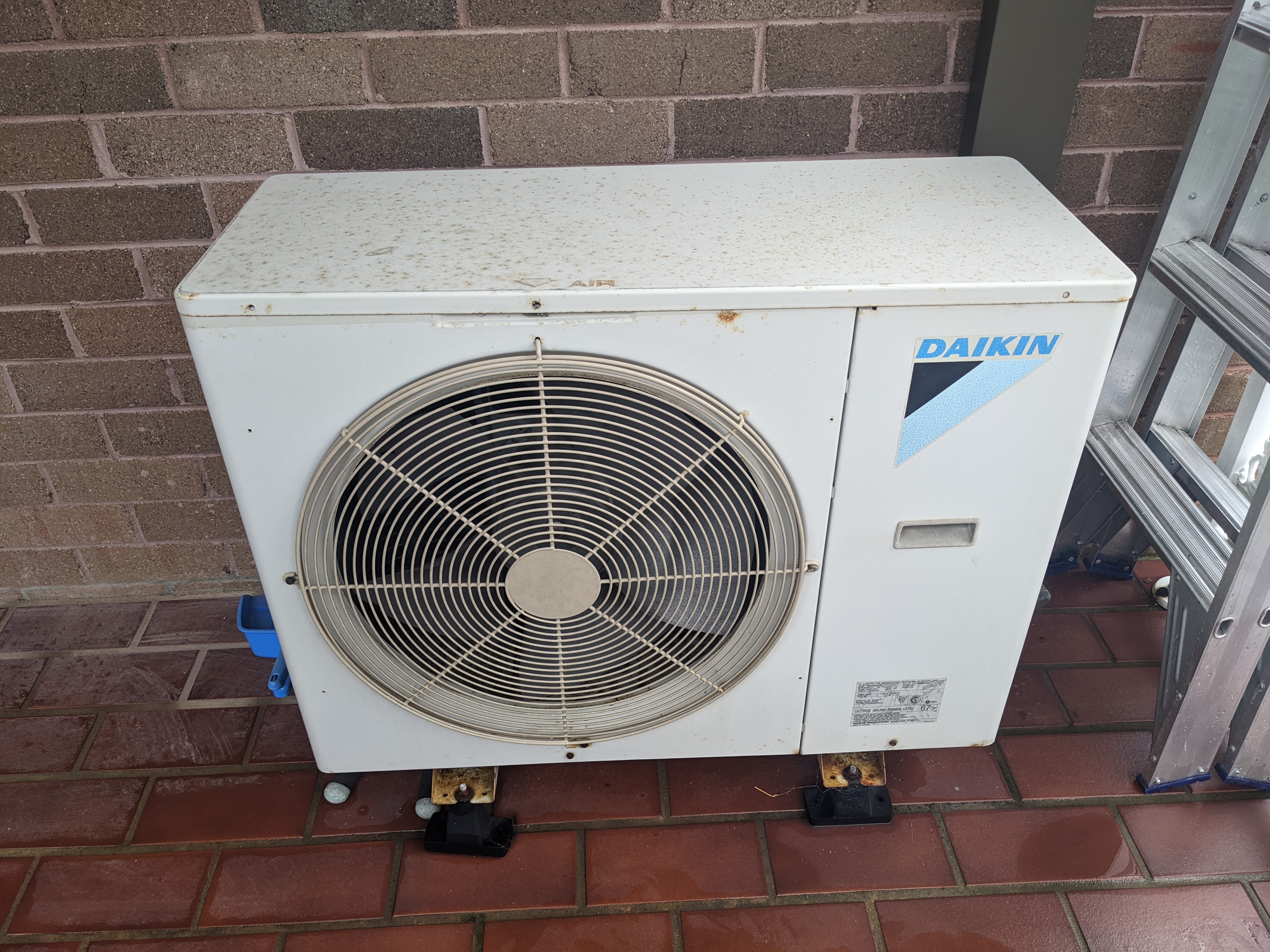 Older Daikin outdoor air conditioner unit ready for replacement